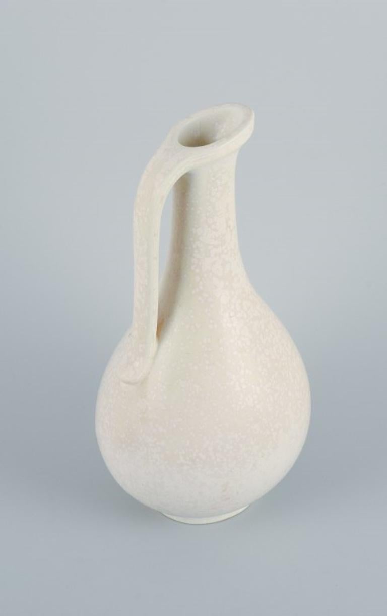 Scandinavian Modern Gunnar Nylund (1904–1997) for Rörstrand. Large jug in eggshell glaze. Mid-20th c For Sale