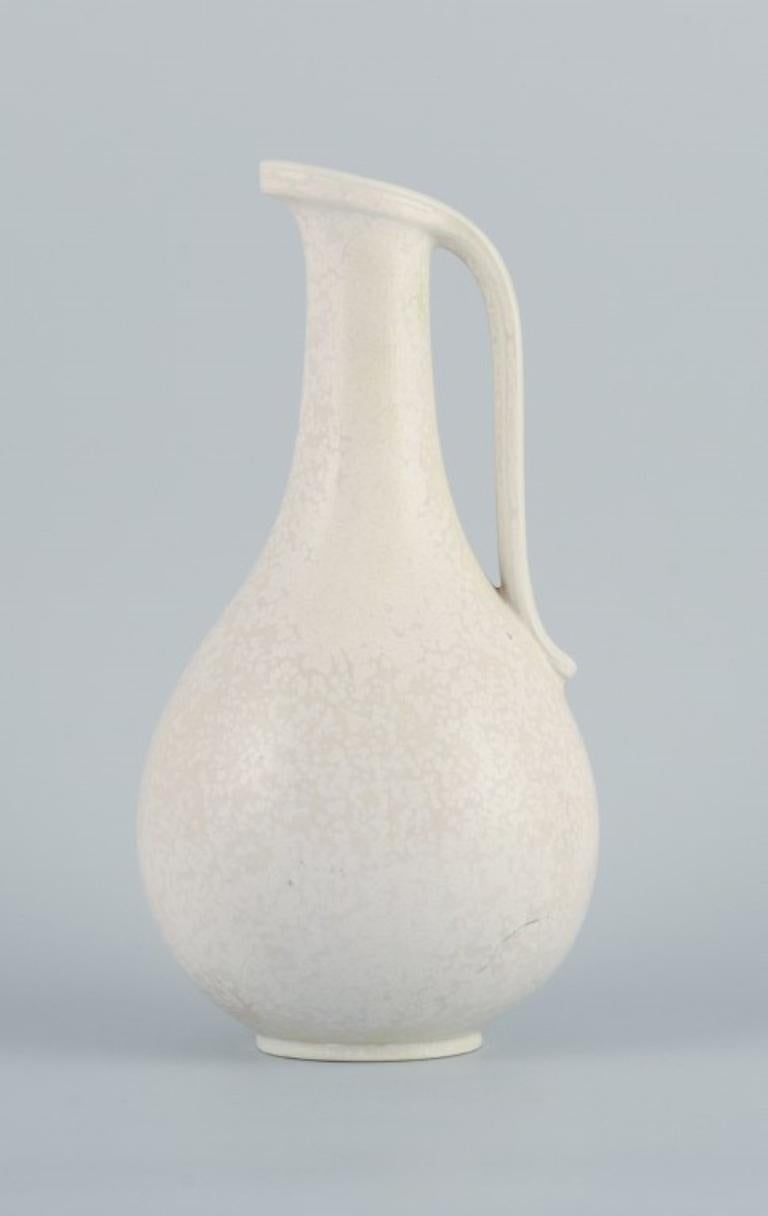Swedish Gunnar Nylund (1904–1997) for Rörstrand. Large jug in eggshell glaze. Mid-20th c For Sale
