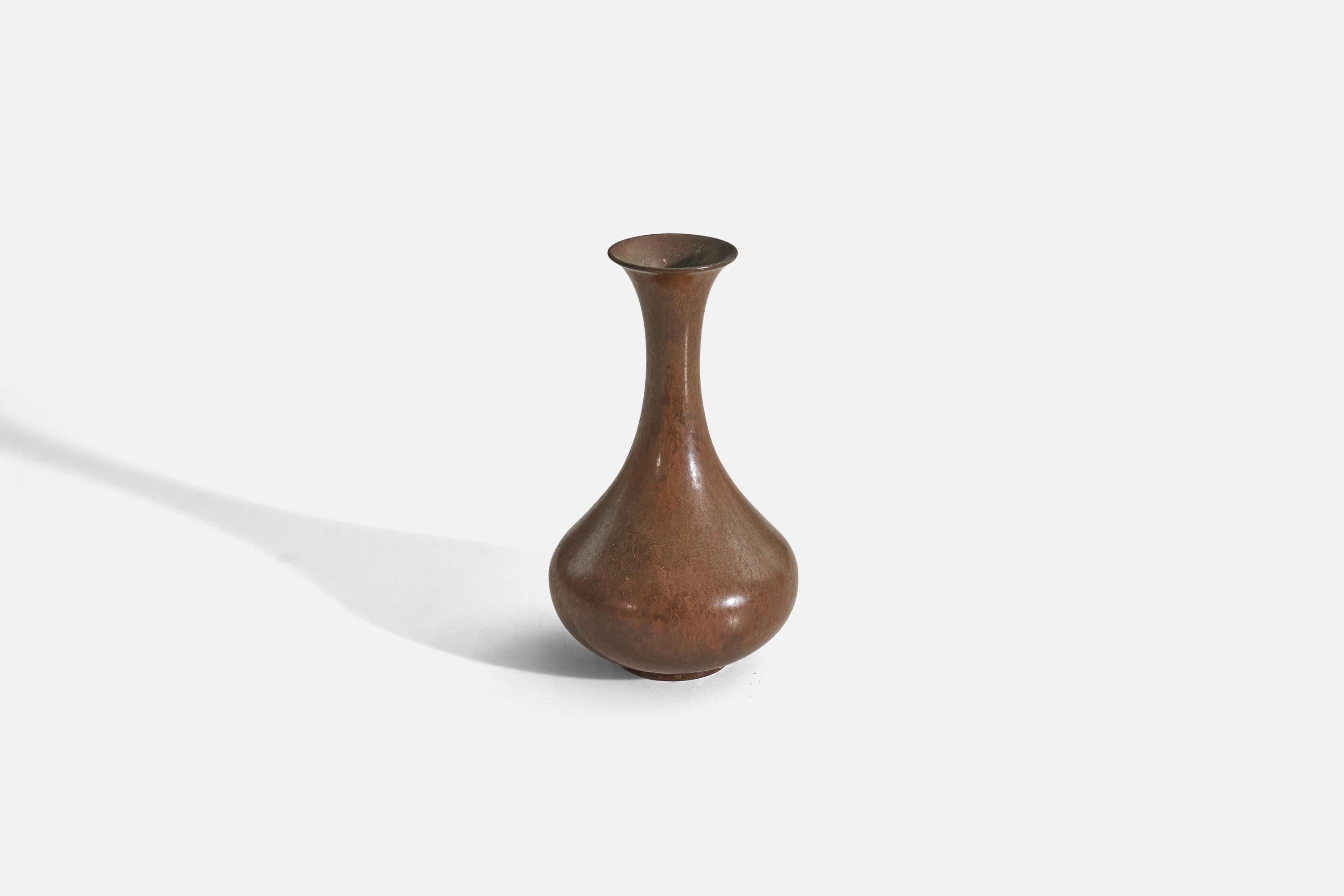 A brown-glazed stoneware vase, 