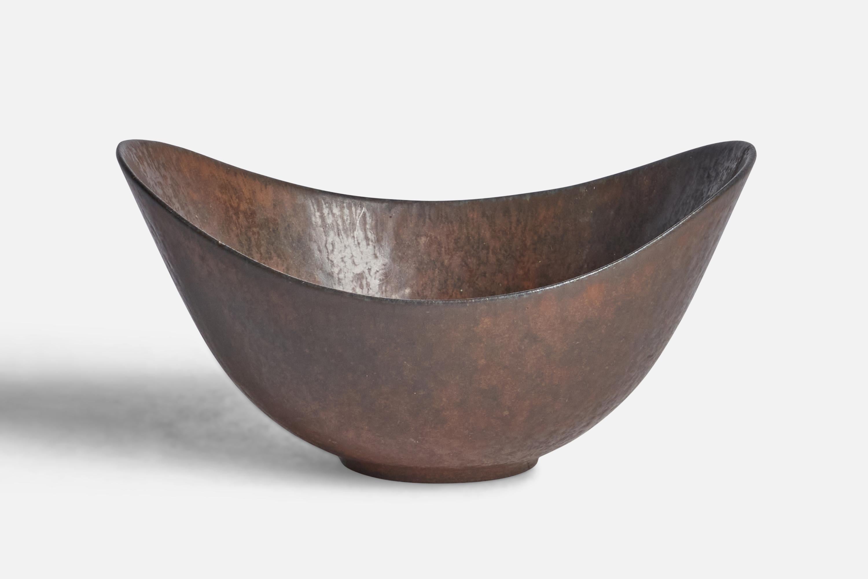 A brown-glazed stoneware bowl designed and produced in Sweden, 1940s.