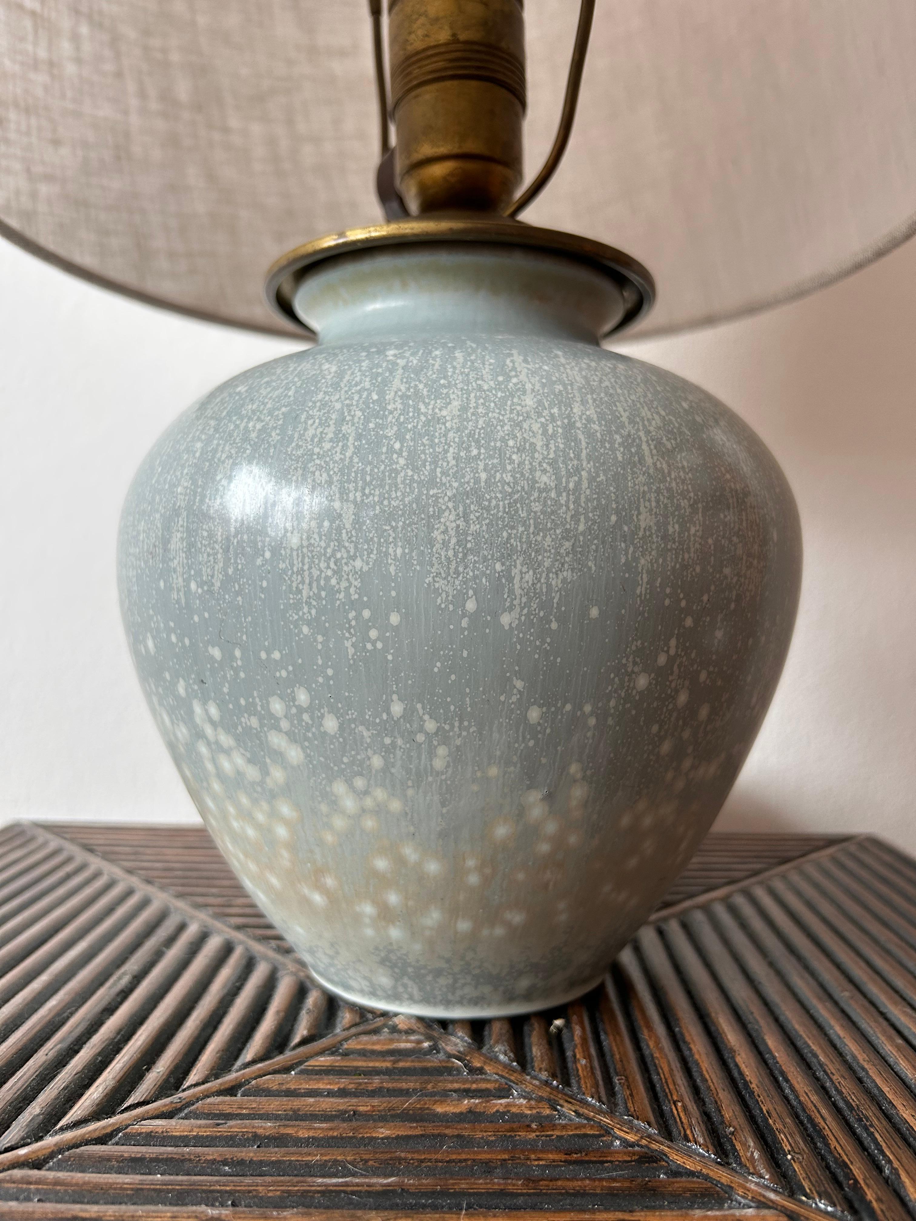 Rare Gunnar Nylund ceramic table lamp made at the Rörstrand studio in Sweden in the 1950’s.

The lamp is in good condition with a beautiful glaze which gives a great structure and detail to the lamp, the lamp still has the original  bulb socket and