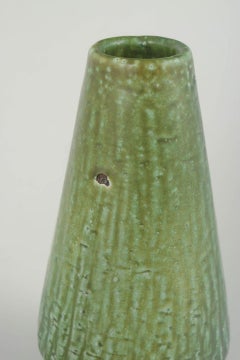 Gunnar Nylund for Nymølle, Denmark. Stoneware vase with green flowing glaze.