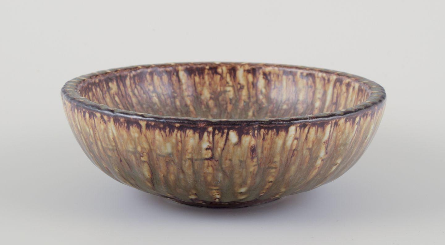 PRE-OWNED GOODS ARE EXEMPT FROM IMPORT TARIFFS FOR U.S., UK, AUSTRALIAN & CANADIAN CUSTOMERS.   
THEREFORE, NO IMPORT TARIFFS WILL BE APPLICABLE TO YOUR PURCHASE. 

Gunnar Nylund for Rörstrand.
Ceramic bowl. Birch tree glaze.
Mid-20th
