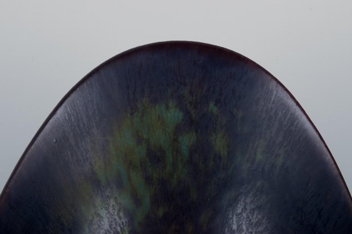 Glazed Gunnar Nylund for Rörstrand. Ceramic bowl with glaze in blue and brown tones. For Sale