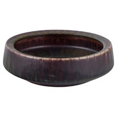 Gunnar Nylund for Rörstrand. Ceramic bowl with glaze in brown and green tones