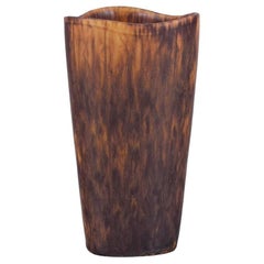 Gunnar Nylund for Rörstrand. Ceramic vase in mottled brown glaze.