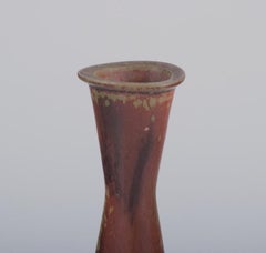 Gunnar Nylund for Rörstrand. Ceramic vase with glaze in brownish tones.