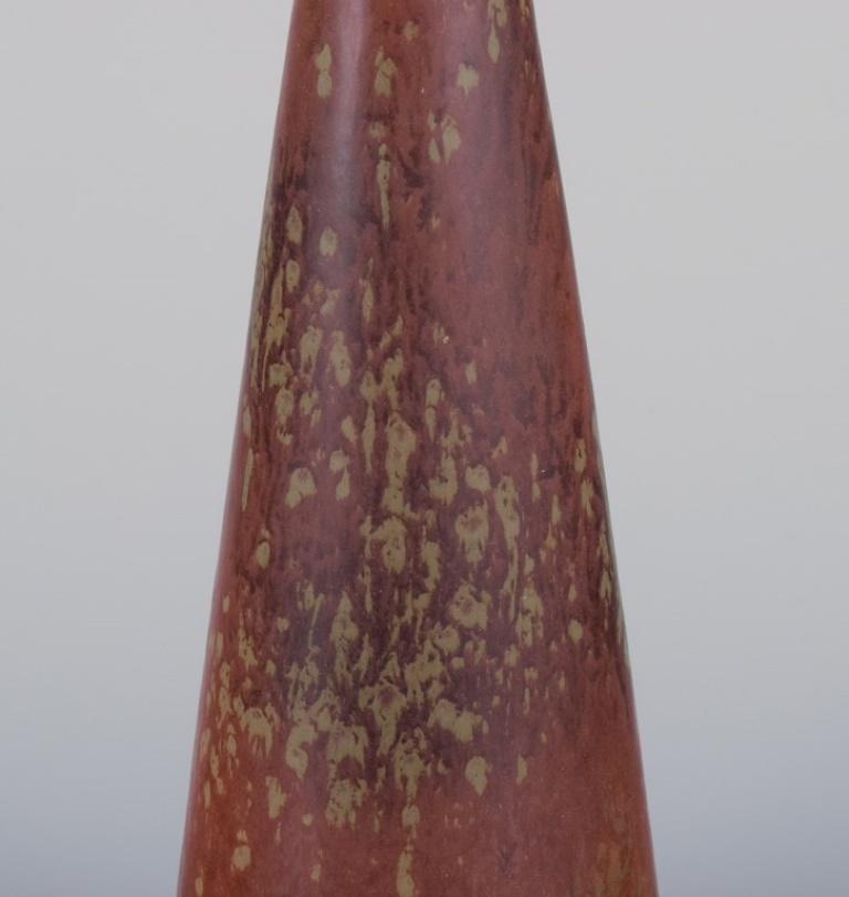Swedish Gunnar Nylund for Rörstrand. Ceramic vase with glaze in brownish tones.  For Sale
