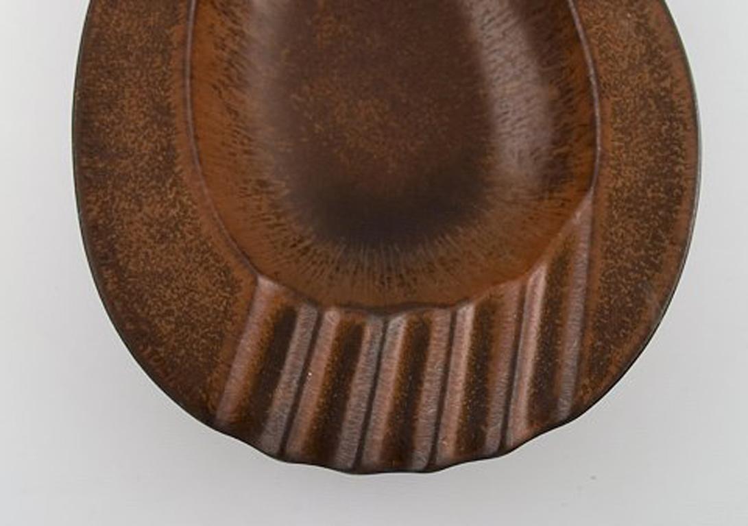 Scandinavian Modern Gunnar Nylund for Rörstrand Large Teardrop Shaped Ceramic Dish in Brown Shades For Sale