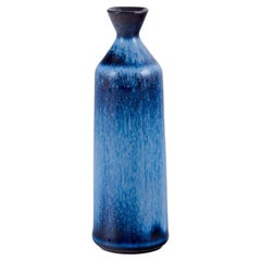 Gunnar Nylund for Rörstrand. Miniature ceramic vase with blue glaze.