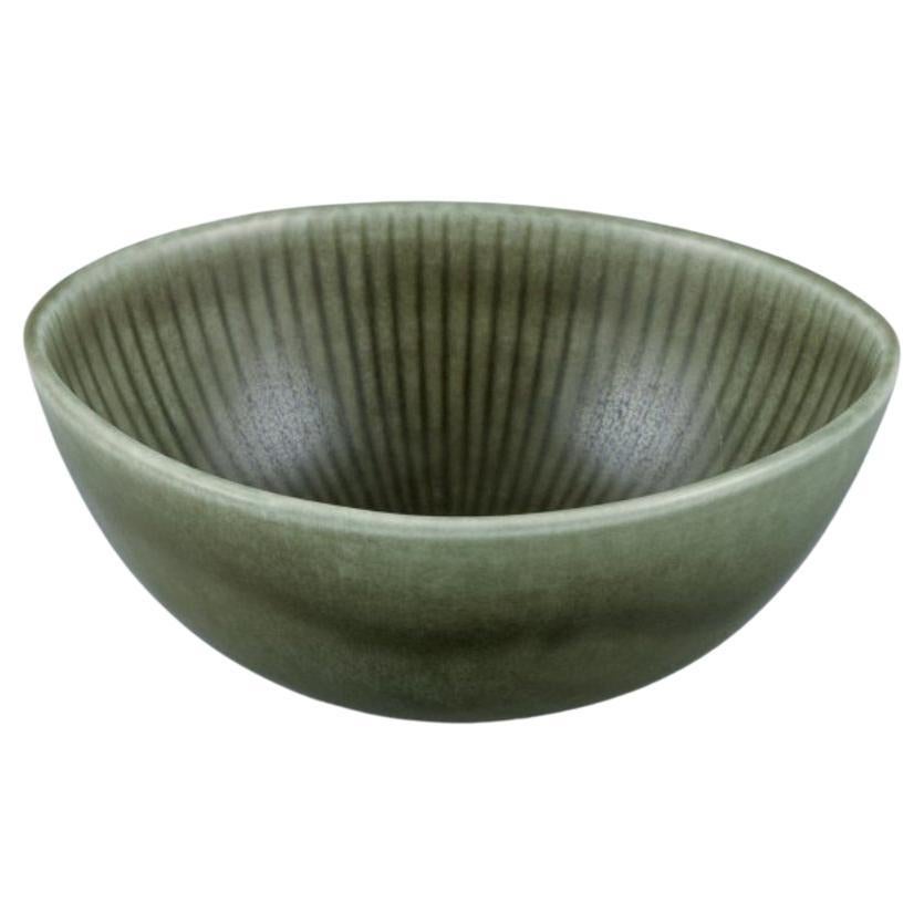 Gunnar Nylund for Rörstrand. "Ritzi" ceramic bowl in green glaze. 1960s. For Sale