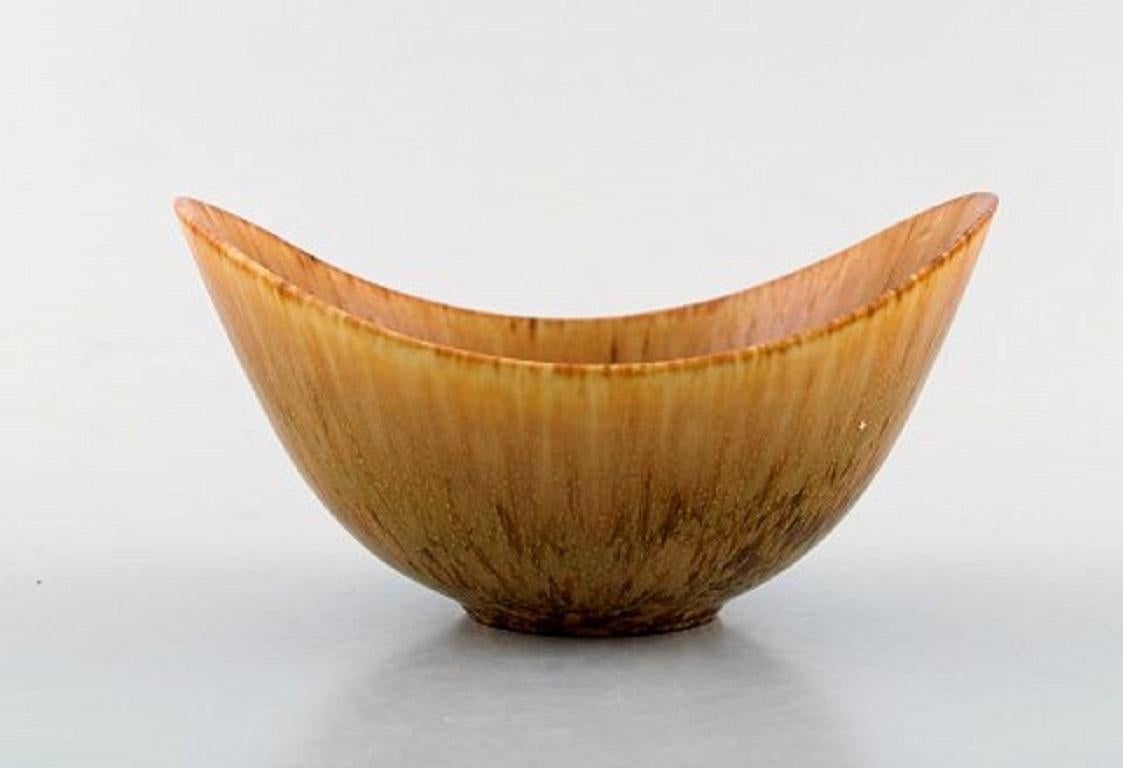 Gunnar Nylund for Rörstrand / Rorstrand. Bowl in glazed ceramics. Beautiful glaze in light brown shades, 1950s-1960s.
In very good condition.
Stamped.
Measures: 10.5 x 5 cm.