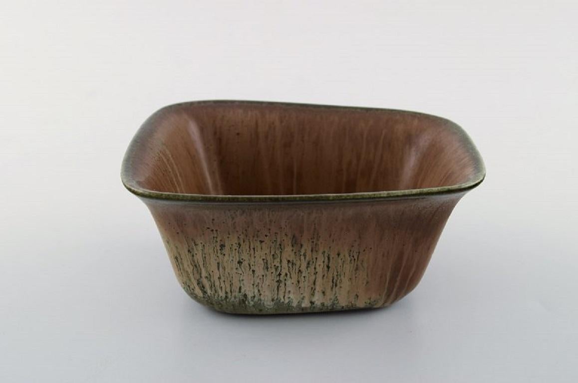 Gunnar Nylund for Rörstrand / Rørstrand. 
Bowl in glazed ceramics. Glaze in light brown and green shades.
In perfect condition.
1st factory quality.
Measures: 14 x 12 x 7 cm.
Signed.