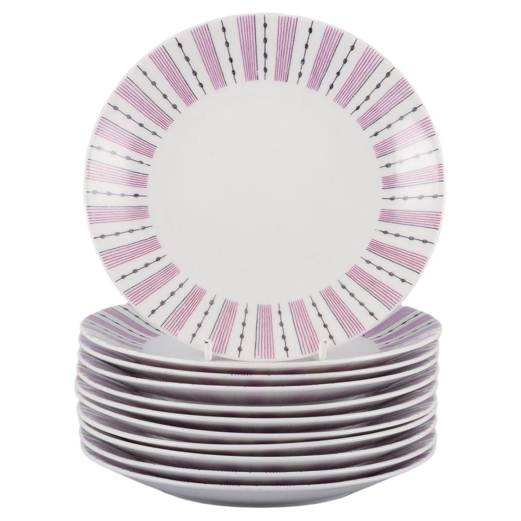Gunnar Nylund for Rörstrand. Set of eleven "Casino" dessert plates. For Sale