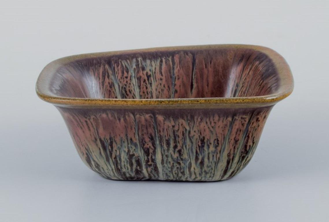 Scandinavian Modern Gunnar Nylund for Rörstrand. Small ceramic bowl with glaze in green-brown tones For Sale