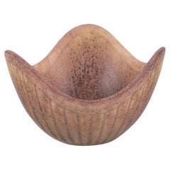 Gunnar Nylund for Rörstrand. Small ceramic bowl with ribbed design.