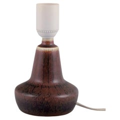 Gunnar Nylund for Rörstrand. Small ceramic table lamp. Glaze in brown tones.
