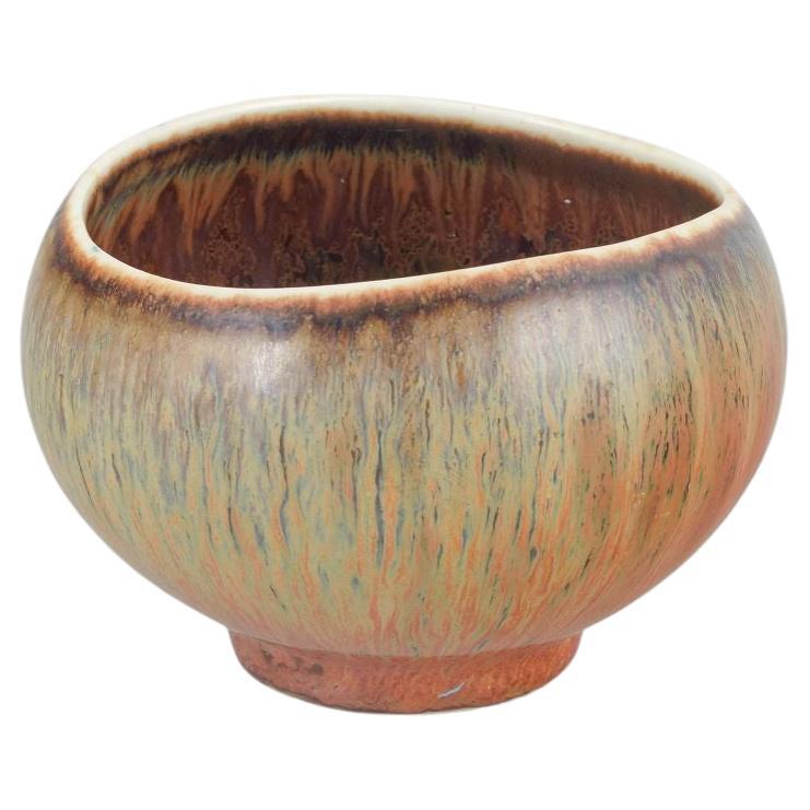 Gunnar Nylund for Rörstrand. Stoneware bowl with multicolored glaze. Mid-20th C.