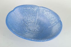 Gunnar Nylund for Rörstrand. Stoneware bowl with organic form and blue glaze.