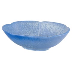 Gunnar Nylund for Rörstrand. Stoneware bowl with organic form and blue glaze.