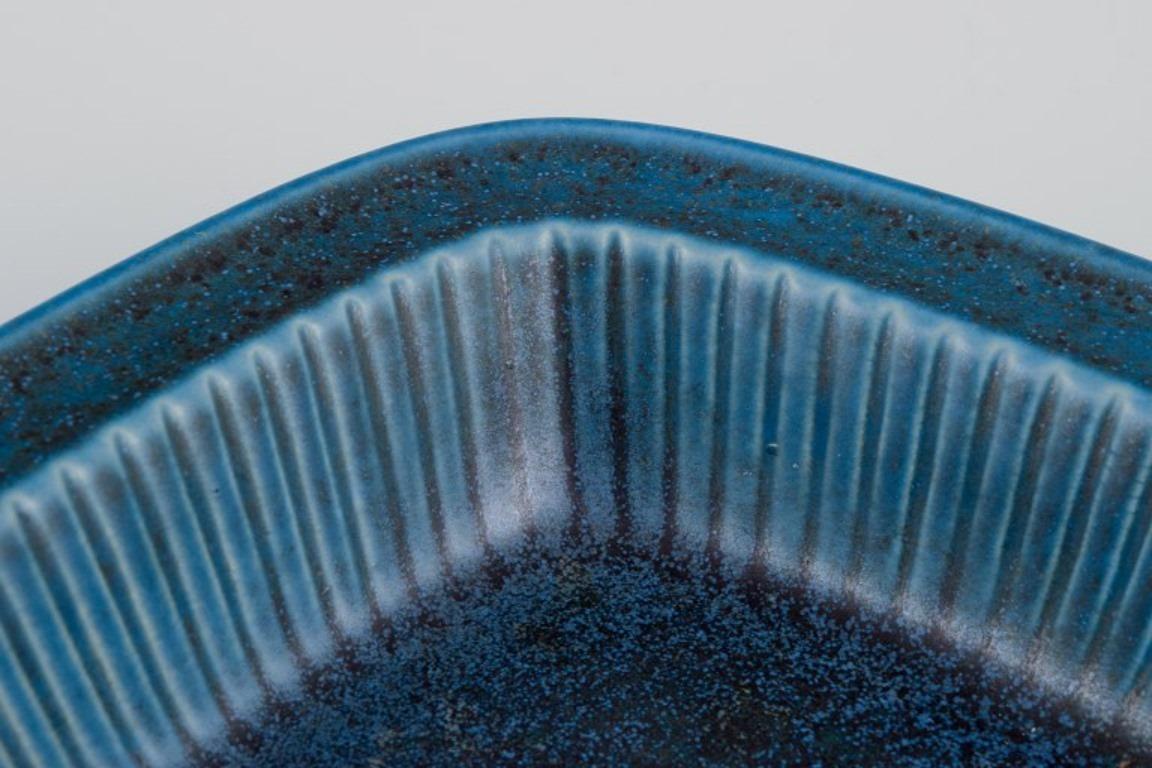 Swedish Gunnar Nylund for Rörstrand, Sweden. Low bowl with blue-toned glaze  For Sale