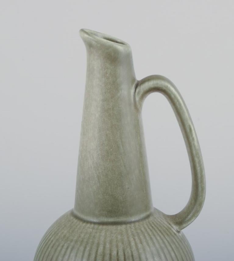 Mid-20th Century Gunnar Nylund for Rörstrand, Sweden. Pair of Ritzi ceramic pitchers. 1960s For Sale