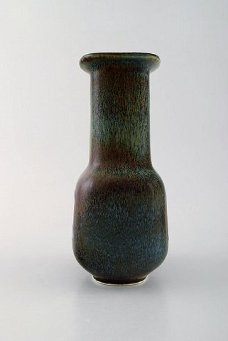 Gunnar Nylund for Rørstrand / Rorstrand. Vase in glazed ceramics. Beautiful glaze in brown and green shades. Mid 20th century.
Measuring: 20.5 x 12 cm.
In very good condition.
1st factory quality.
Stamped.