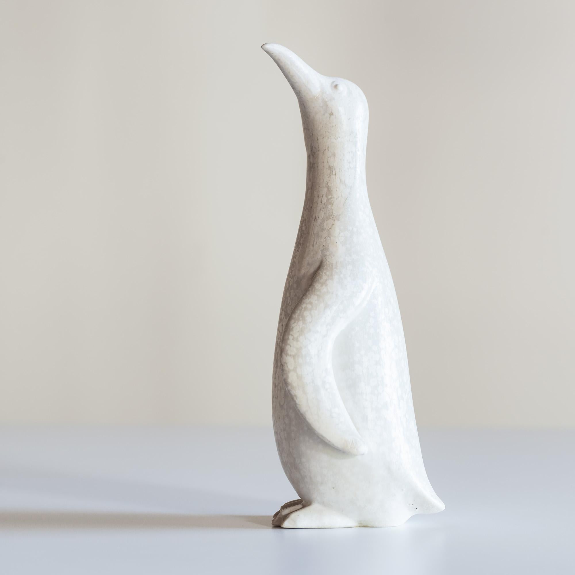 Gunnar Nylund stoneware penguin in mottled snow-white glaze for Ro¨rstrand, Sweden.