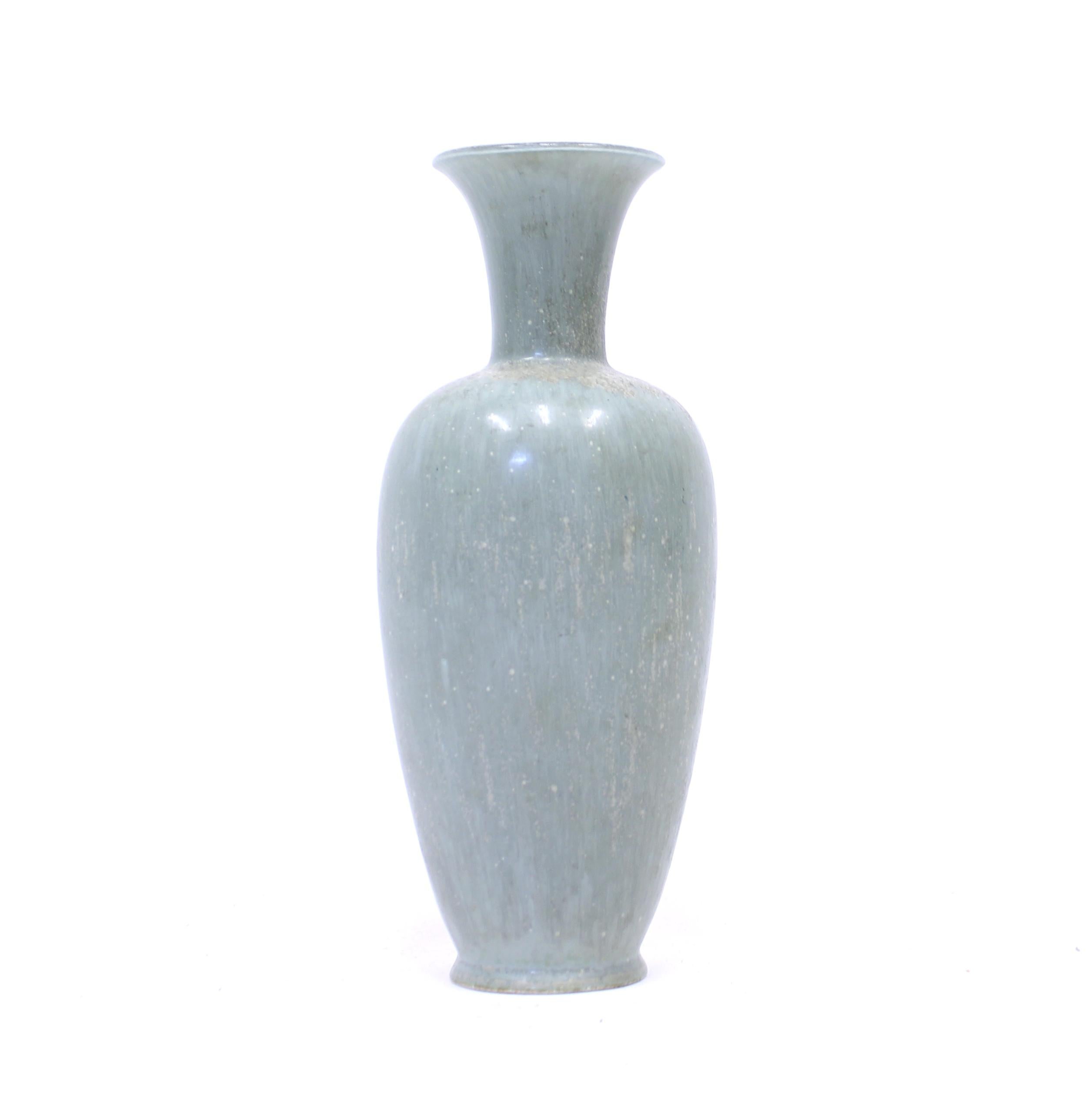 Large light green stoneware vase designed by Gunnar Nylund for Rörstrand in the 1950s. This glaze and size of 32 cm in height was produced as a special commission for Swedish soap manufacturer 