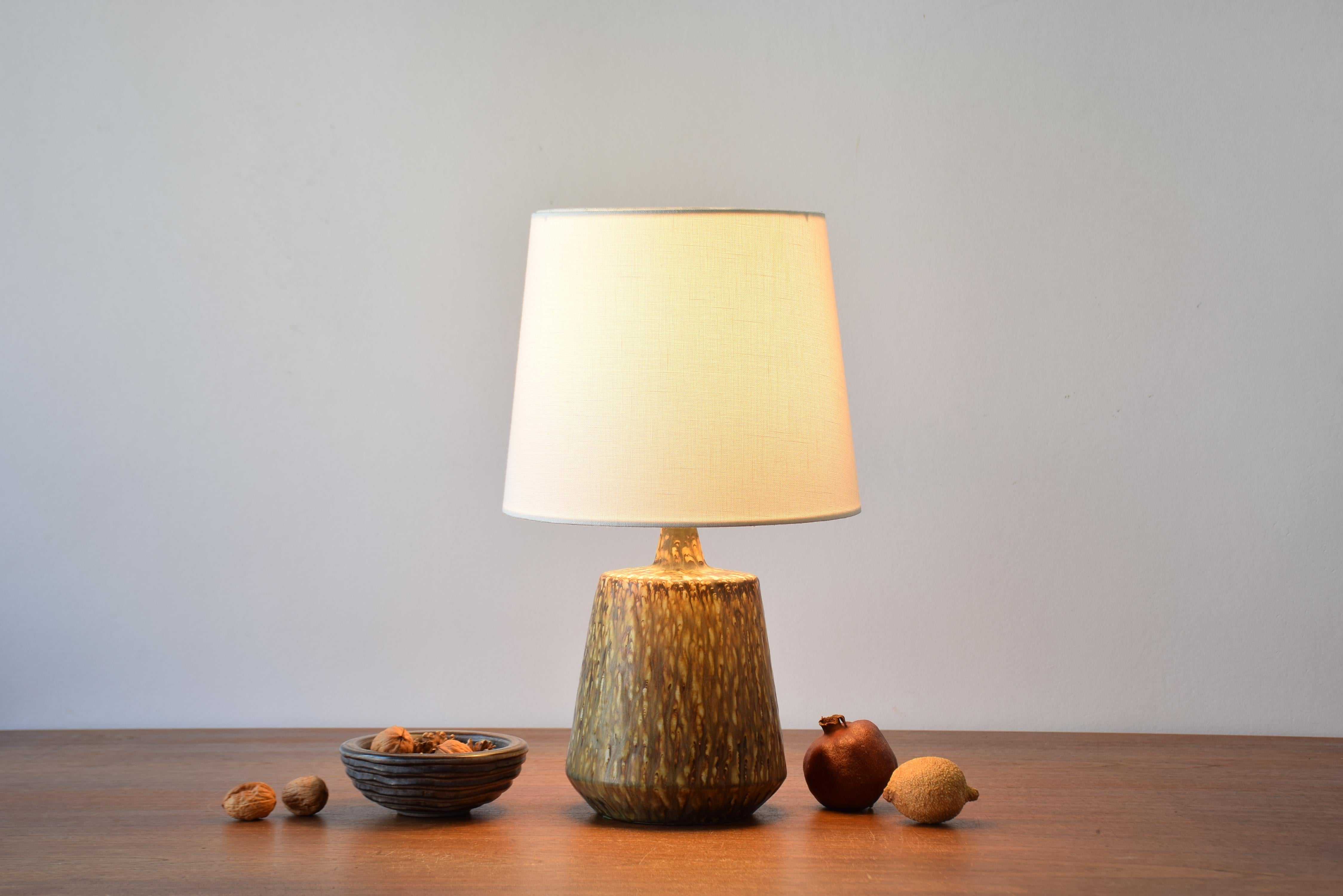Tall ceramic table lamp by Gunnar Nylund for Rörstrand, Sweden.
It´s part of the 