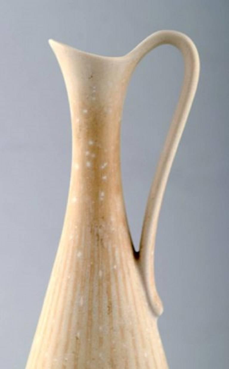 Gunnar Nylund, Rörstrand vase / pitcher in ceramics.
Beautiful eggshell glaze.
In perfect condition. 1st. assortment.
Measures: 19.5 cm x 7 cm.
Stamped.