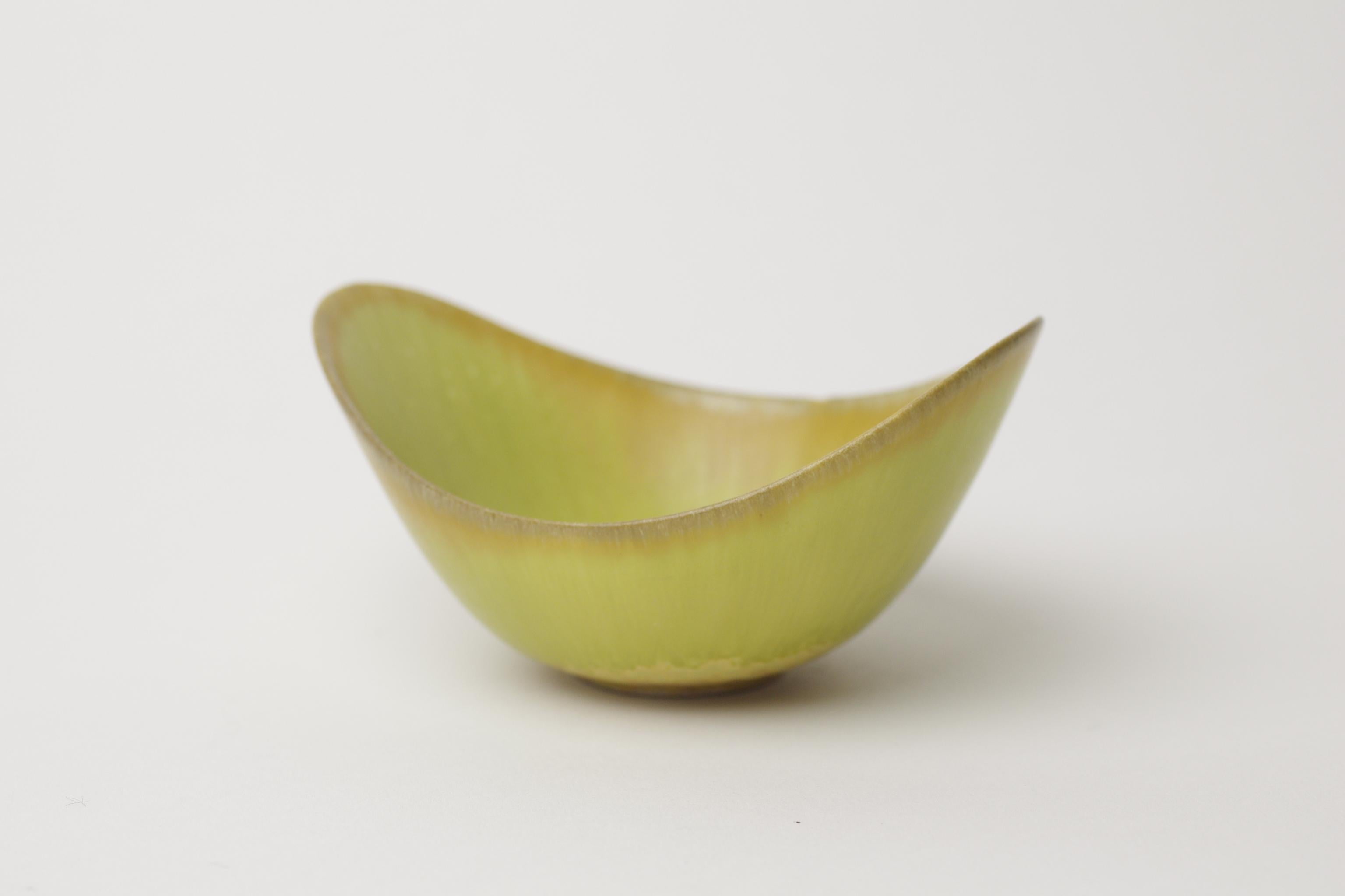 Product Description: 
Gunnar Nylund, one of Sweden's leading ceramic artists, lived and worked all over Scandinavia being involved with Bing & Gröndahl in Denmark, Rörstrand in Sweden and studying in Helsinki. His work is exhibited in many museums