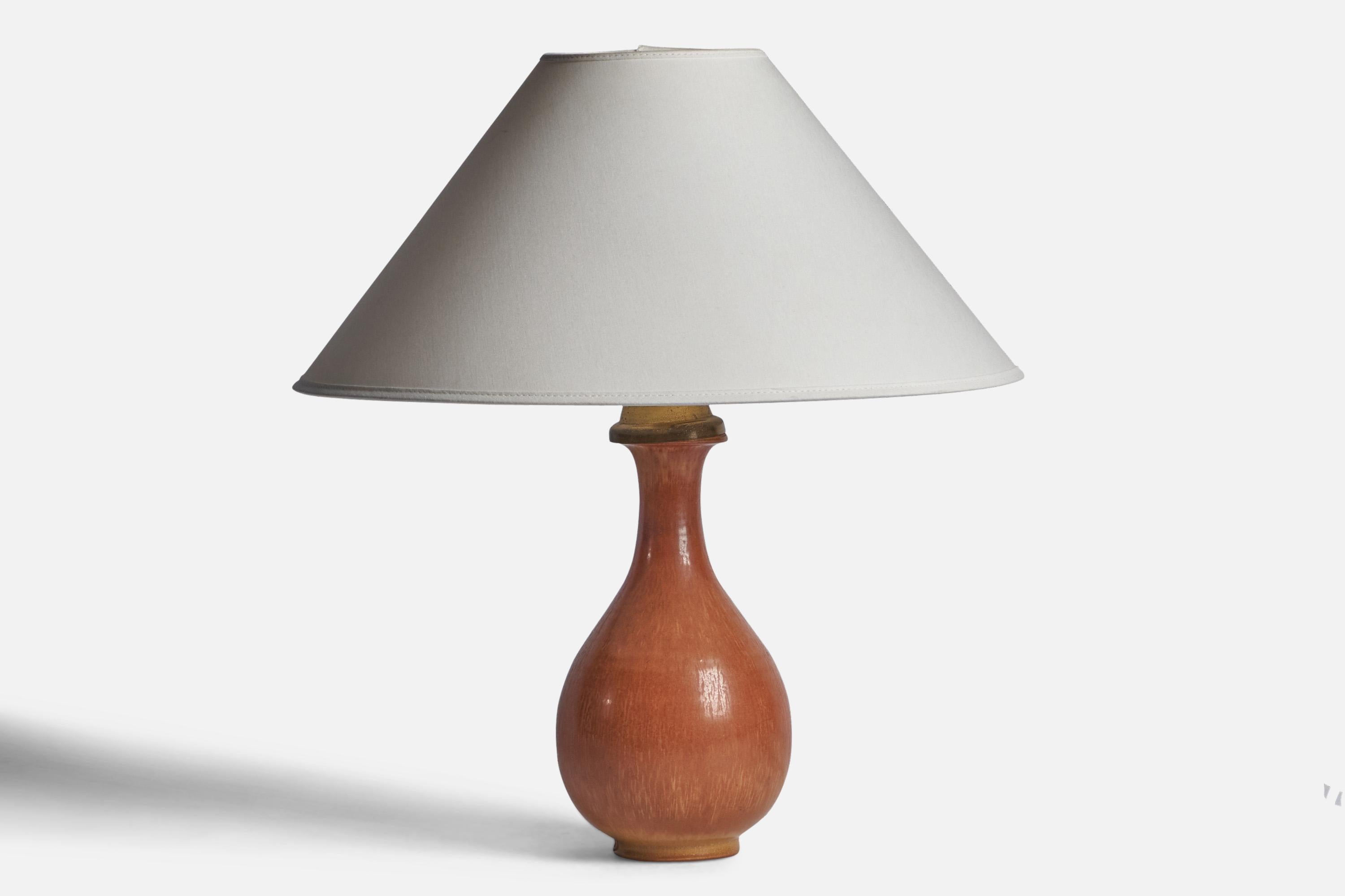 A brown-glazed stoneware table lamp designed by Gunnar Nylund and produced by Rörstrand, Sweden, 1940s.

Dimensions of Lamp (inches): 13.25” H x 5.2” Diameter
Dimensions of Shade (inches): 4.5” Top Diameter x 16” Bottom Diameter x 7.15” H