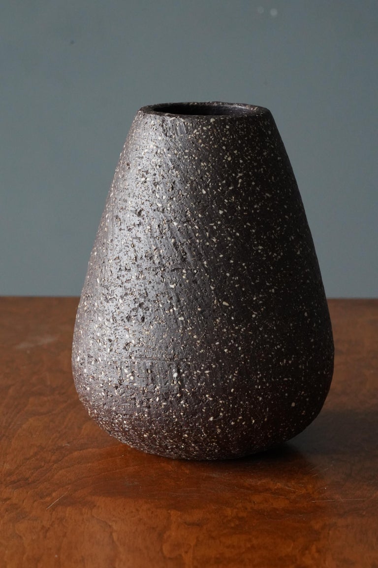 A vase produced by Rörstrand, Sweden, 1950s. Designed by Gunnar Nylund, (Swedish, 1914-1997). Stamped. 

Nylund served as artistic director at Rörstrand, where he worked, 1931-1955. Prior to his work at Rörstrand he was a well-established ceramic