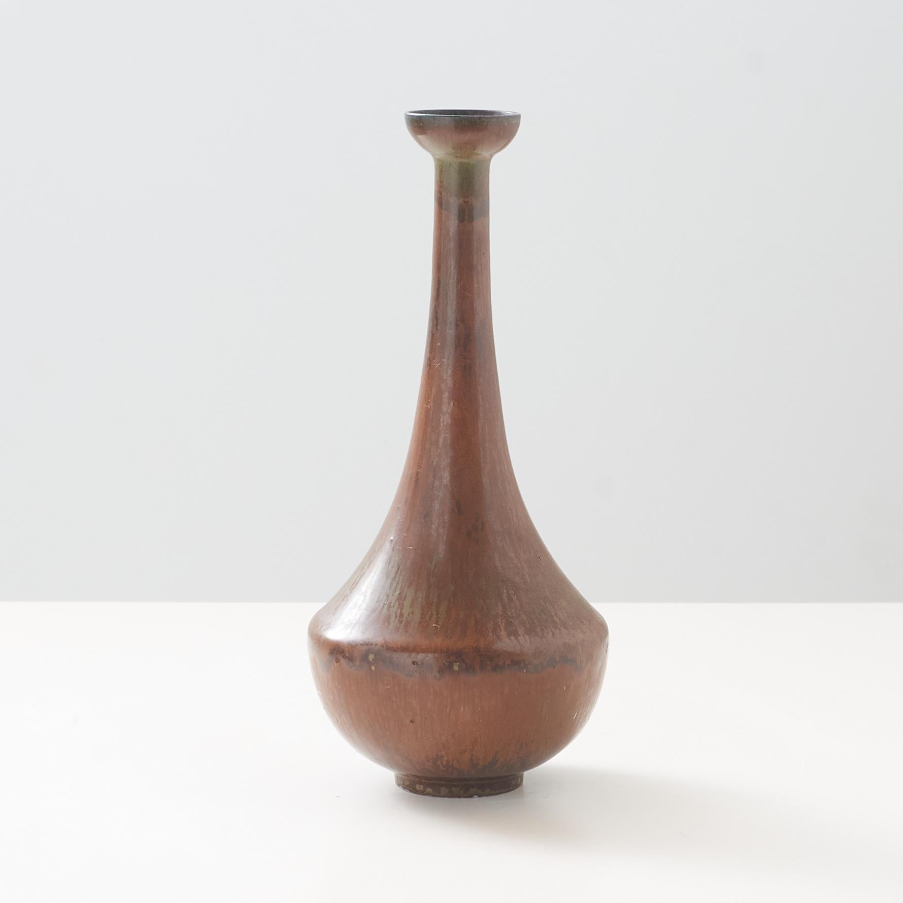 Stoneware vase with matte brown haresfur glaze. Incised 