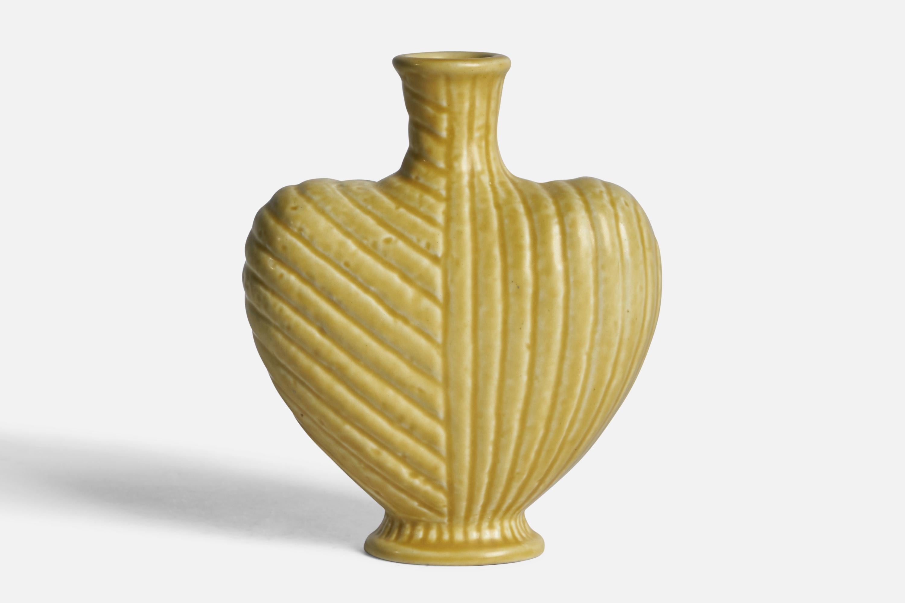 A yellow-glazed stoneware vase designed by Gunnar Nylund and produced by Rörstrand, Sweden, 1940s.