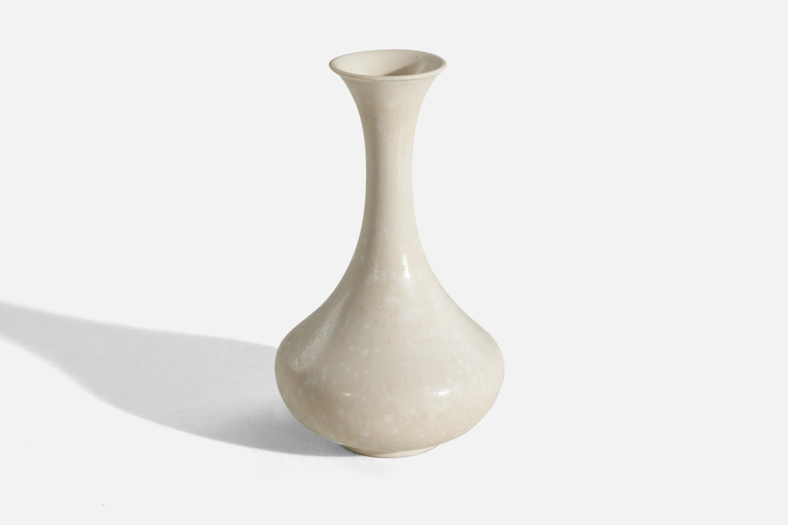 A white, glazed stoneware vase designed by Gunnar Nylund and produced by Rörstrand, Sweden, 1950s.