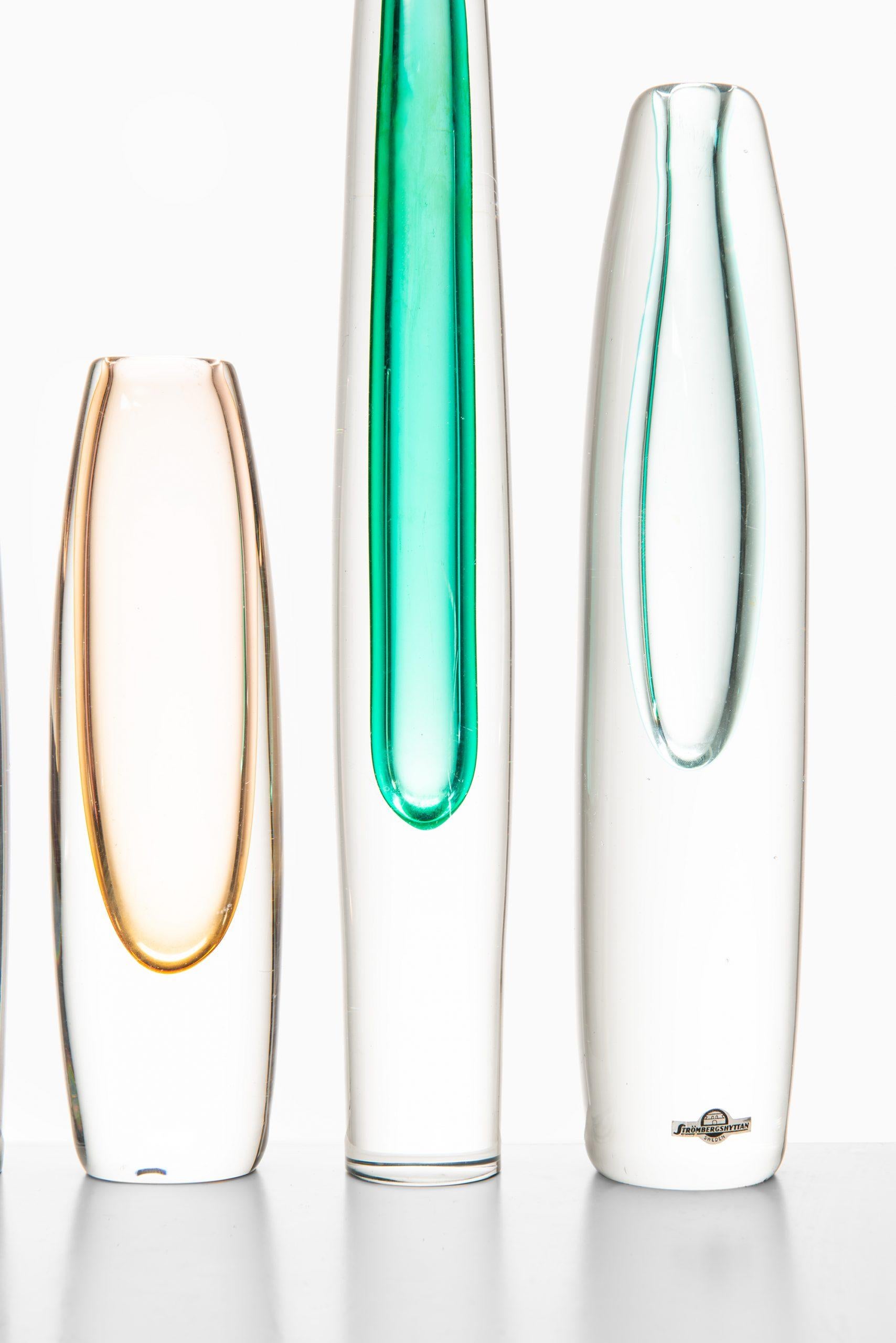 A set of 7 glass vases designed by Gunnar Nylund. Produced by Strömbergshyttan in Sweden.
Dimensions for the highest (W x D x H): 5 x 5 x 36 cm.