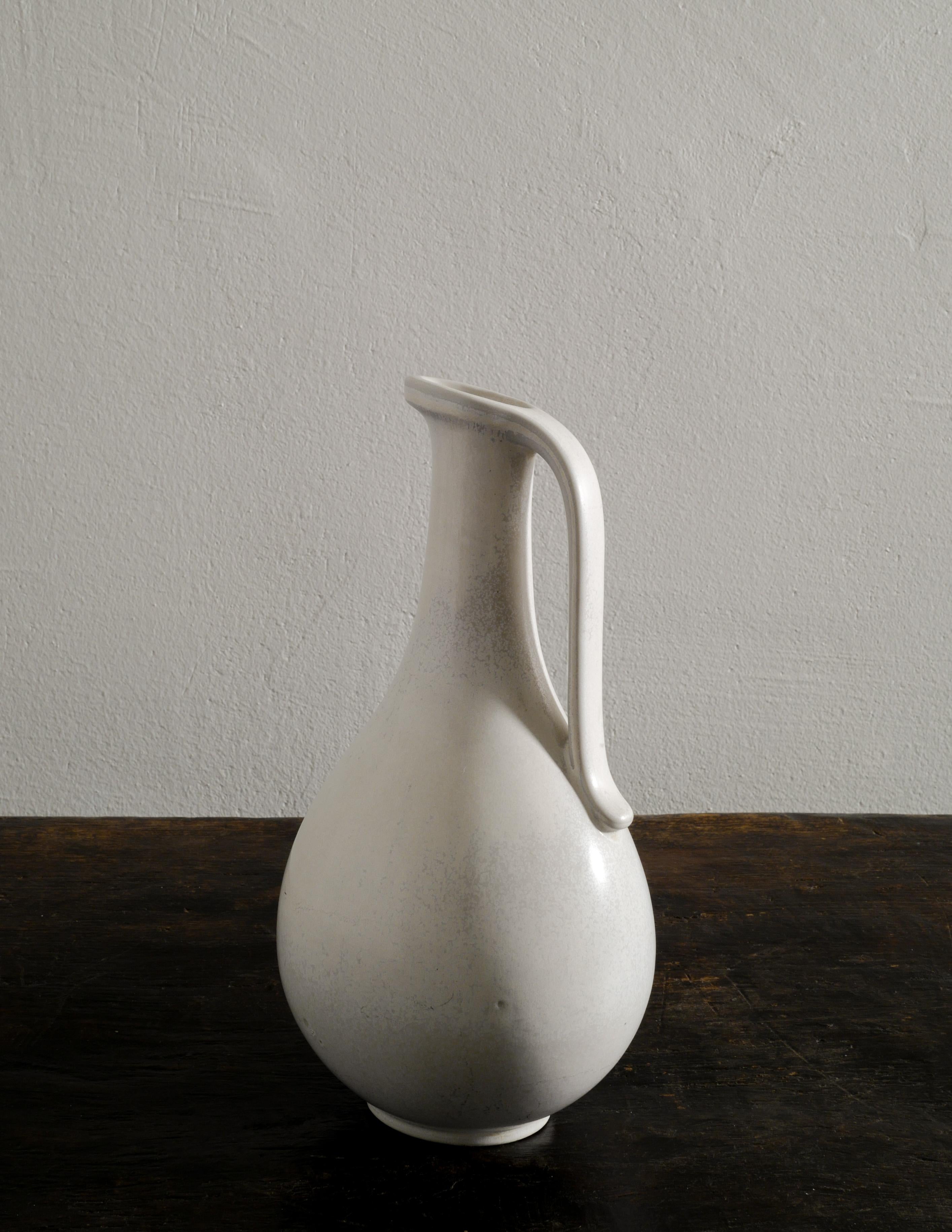 Gunnar Nylund White Mid-Century Ceramic Pitcher Jar by Rörstrand in Sweden 1950s In Fair Condition For Sale In Stockholm, SE