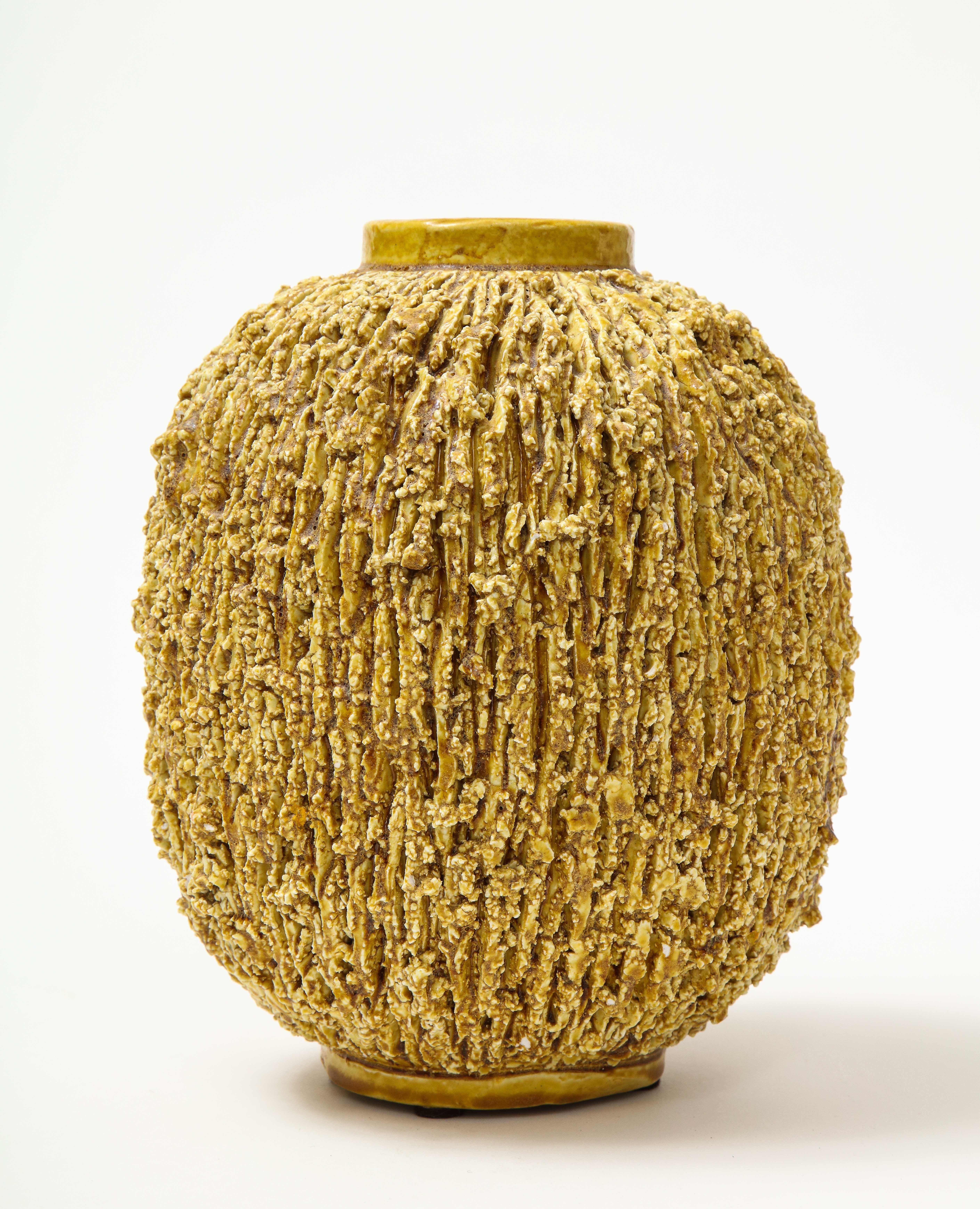 A yellow Chamotte vase by Swedish designer Gunnar Nylund. Produced at Rörstrand.