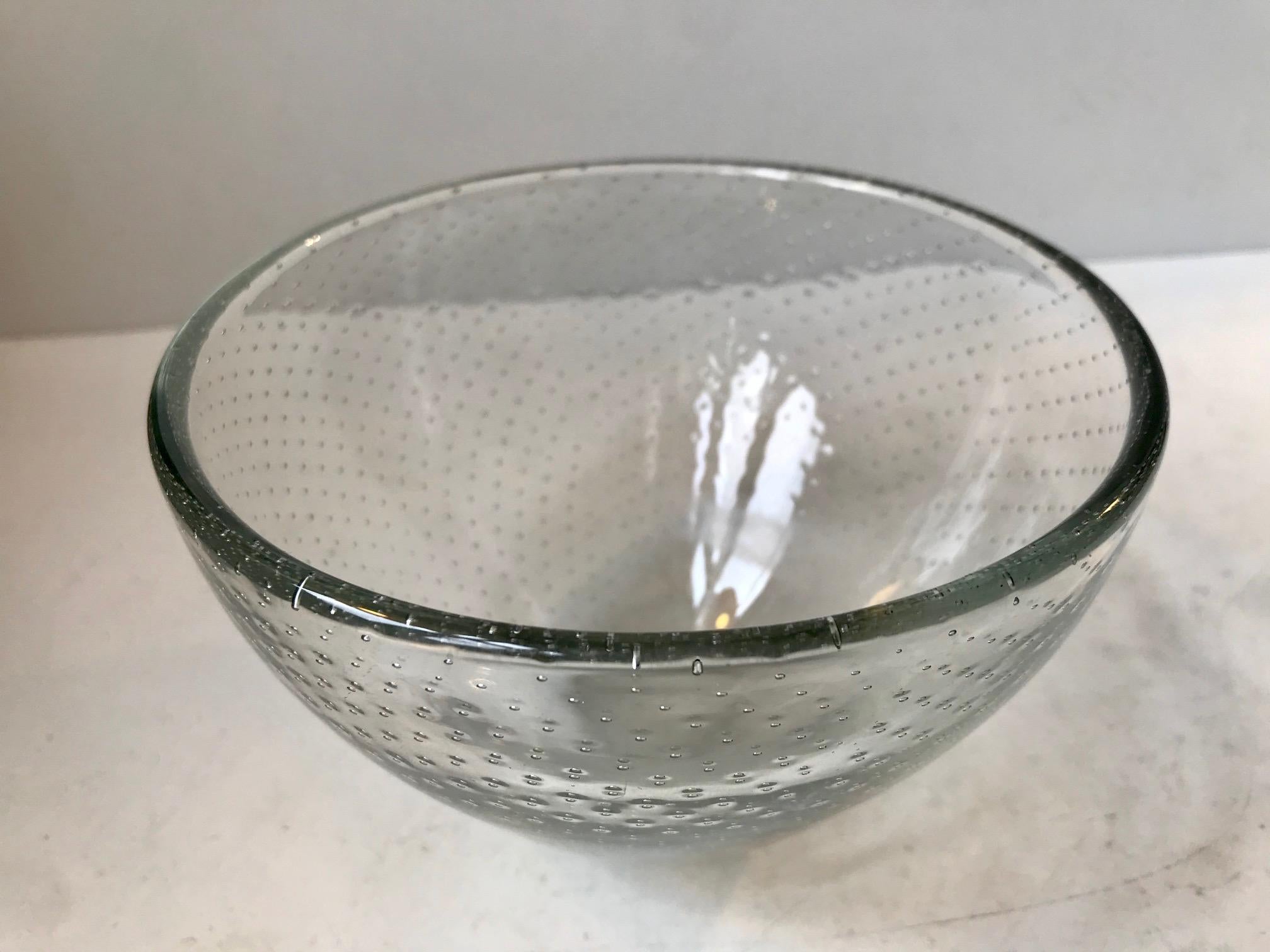 Unique blown glass bowl, internally decorated with control bubbles, Its is an early piece designed by Gunnel Nyman during the 1940s where it was made at the glass studio Nuutajarvi Nottsjo in Finland. It is acid painted 