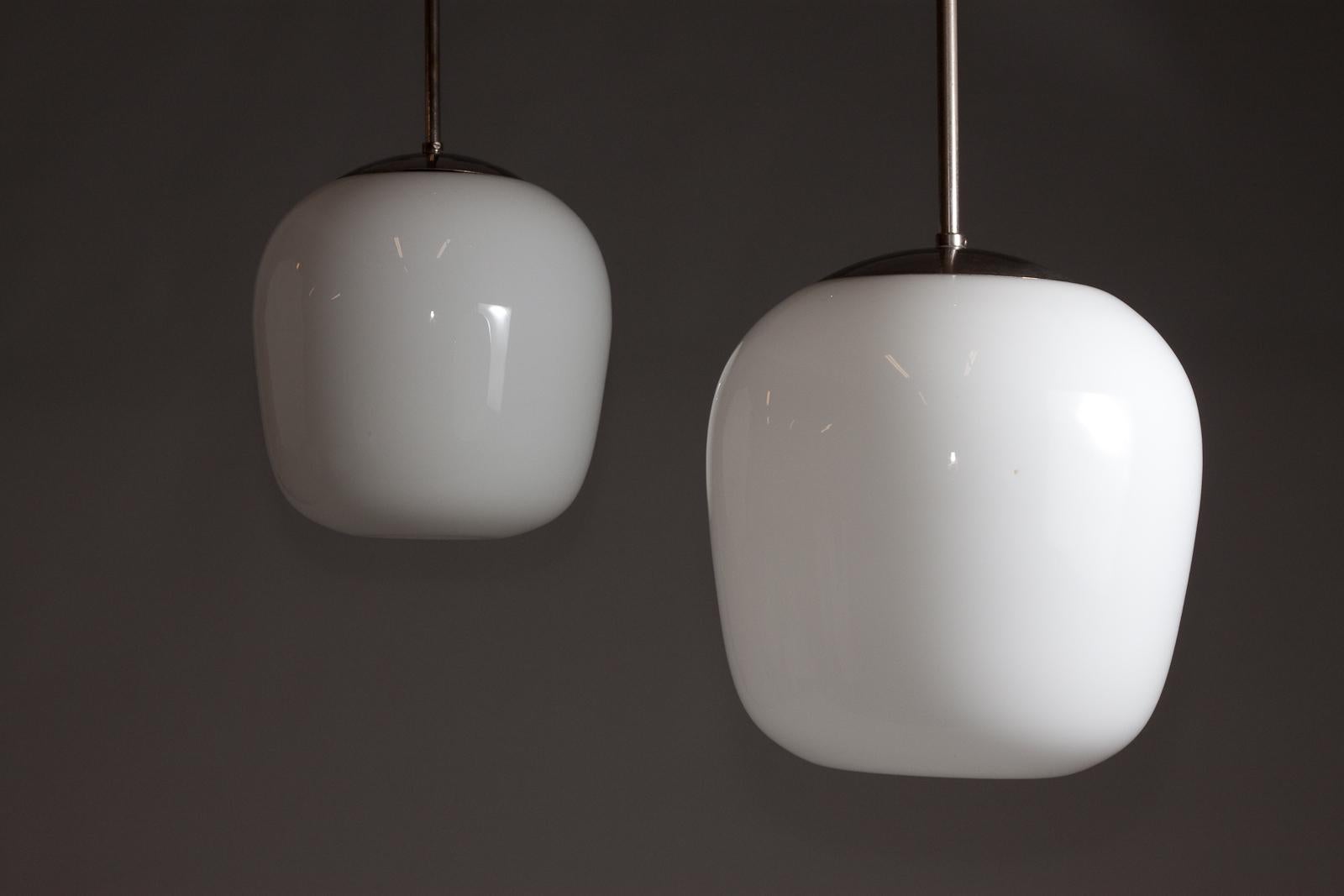 Plated Gunnel Nyman, pair of 1940's opaline glass pendant lamps for Idman Oy For Sale