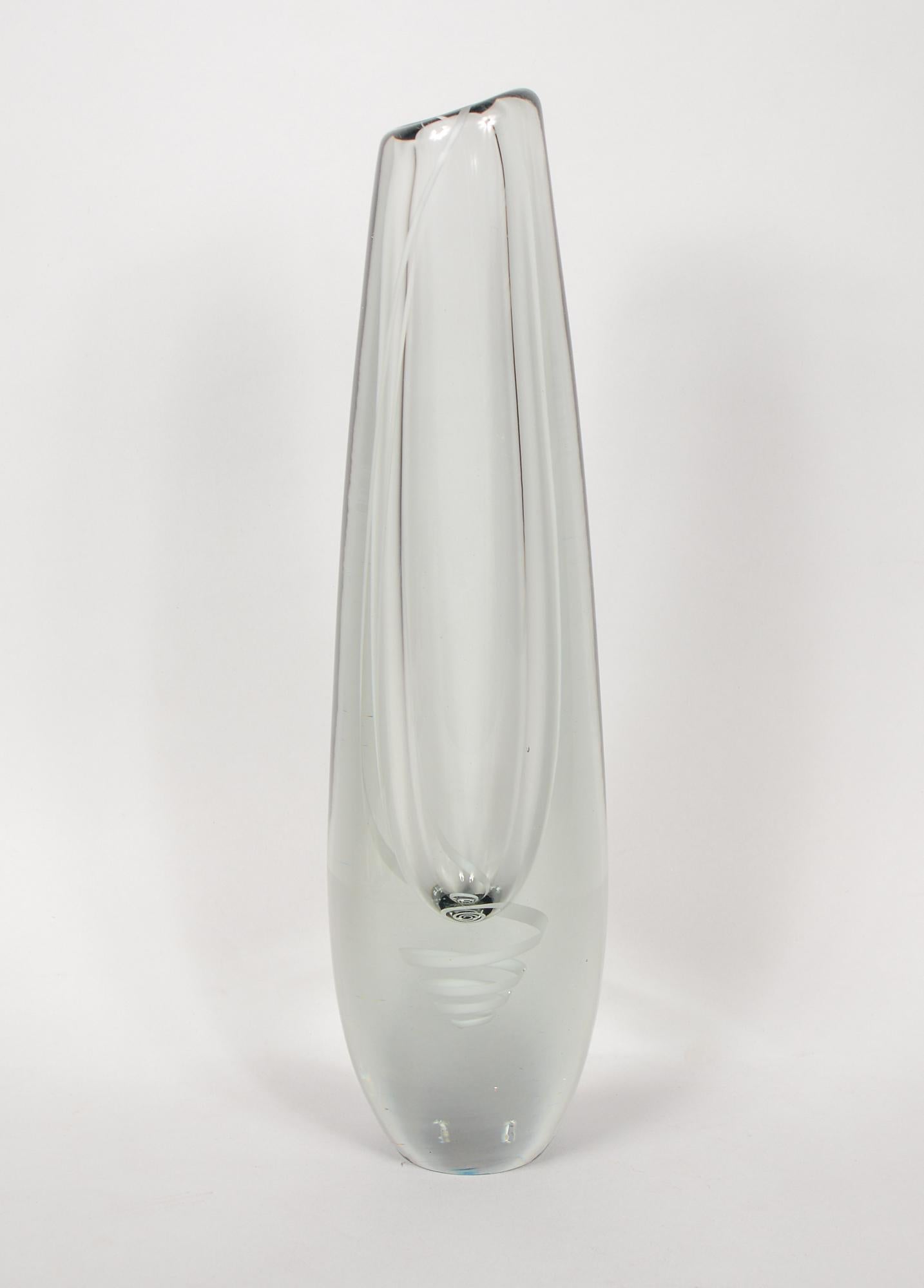 Serpentini vase designed by Gunnel Nyman in 1954. The vase was produced by Nuutajarvi Notsjo. This tall vase has a white ribbon that comes down from the lip and becomes an elongated spiral below the vase cavity. Fully signed on the bottom. There are