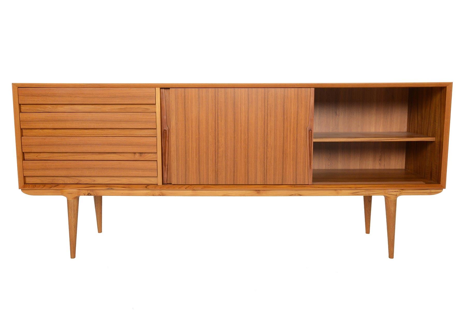 Omann Jun Møbelfabrik (founded in 1933 by Andreas Omann), produced some of the most iconic Danish designs of the 1950s and 1960s. In production again for the first time, this family owned company has re-issued the classic Model 18 credenza for a new