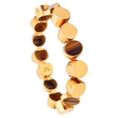 GÜNTER KRAUSS 1970 Bracelet géométrique moderniste en or 18Kt et yeux de tigre