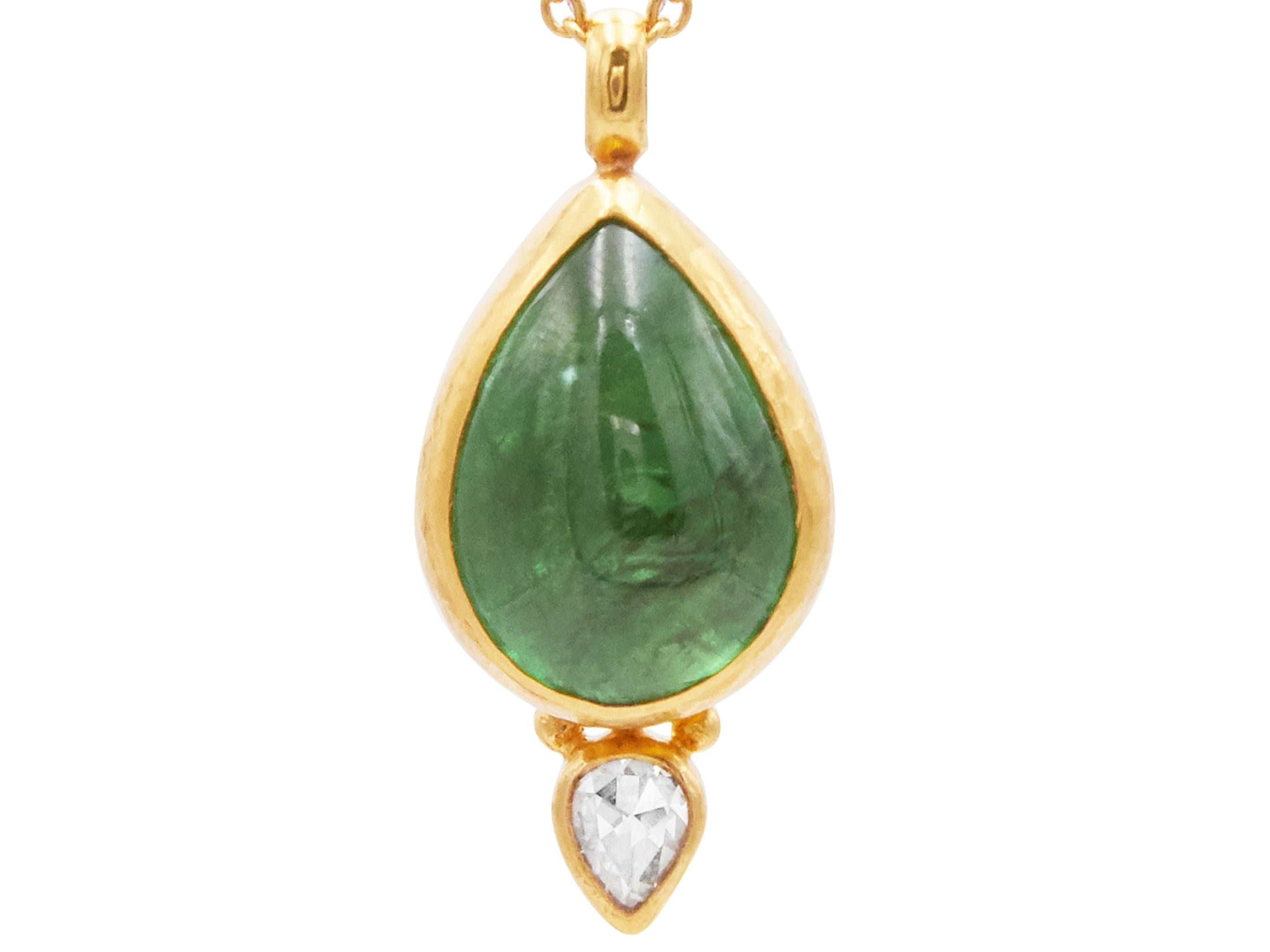 GURHAN one-of-a-kind pendant necklace set in 24 Karat hammered yellow gold featuring a 18x13mm cabochon Tsavorite, 15.59 cts., and rosecut white diamond, 0.22cts. 16-18