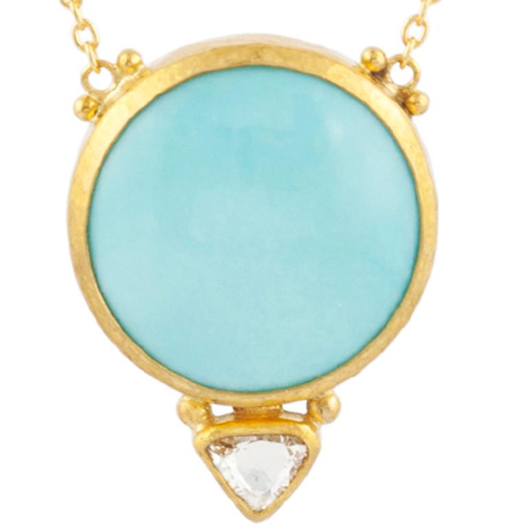 GURHAN one-of-a-kind pendant necklace set in 24 Karat hammered yellow gold featuring a 20mm cabochon Sleeping Beauty Turquoise, 2.82gr., and rosecut white diamond, 0.54cts. 16-18
