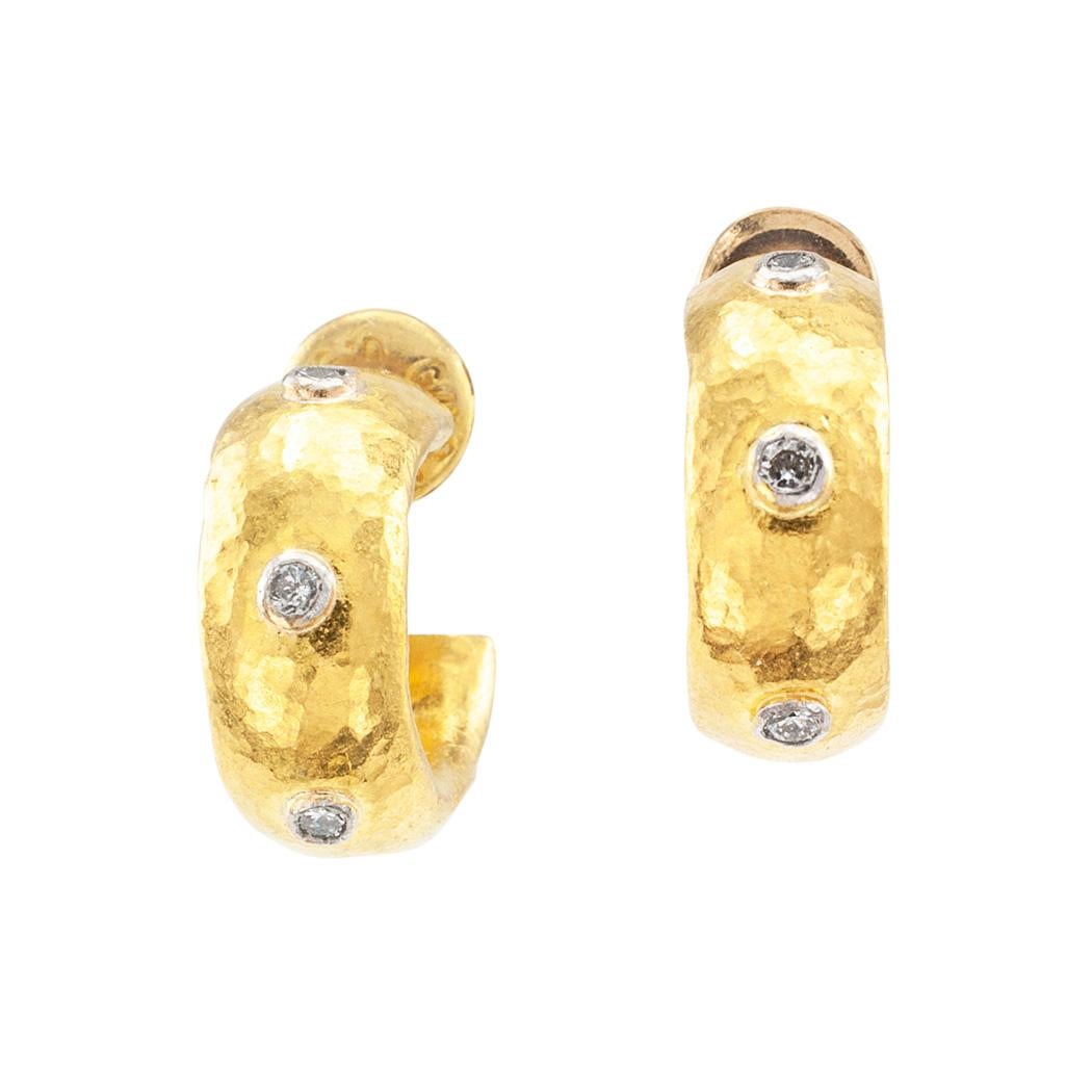 Gurhan diamond and 24 karat yellow gold hoop earrings.

DETAILS:
DIAMONDS:  six round brilliant-cut diamonds totaling approximately 0.15 carat.

METAL:  24-karat yellow gold.

WEIGHT:  7.0 grams.

EARRING BACKS:  posts with push backs, one of the