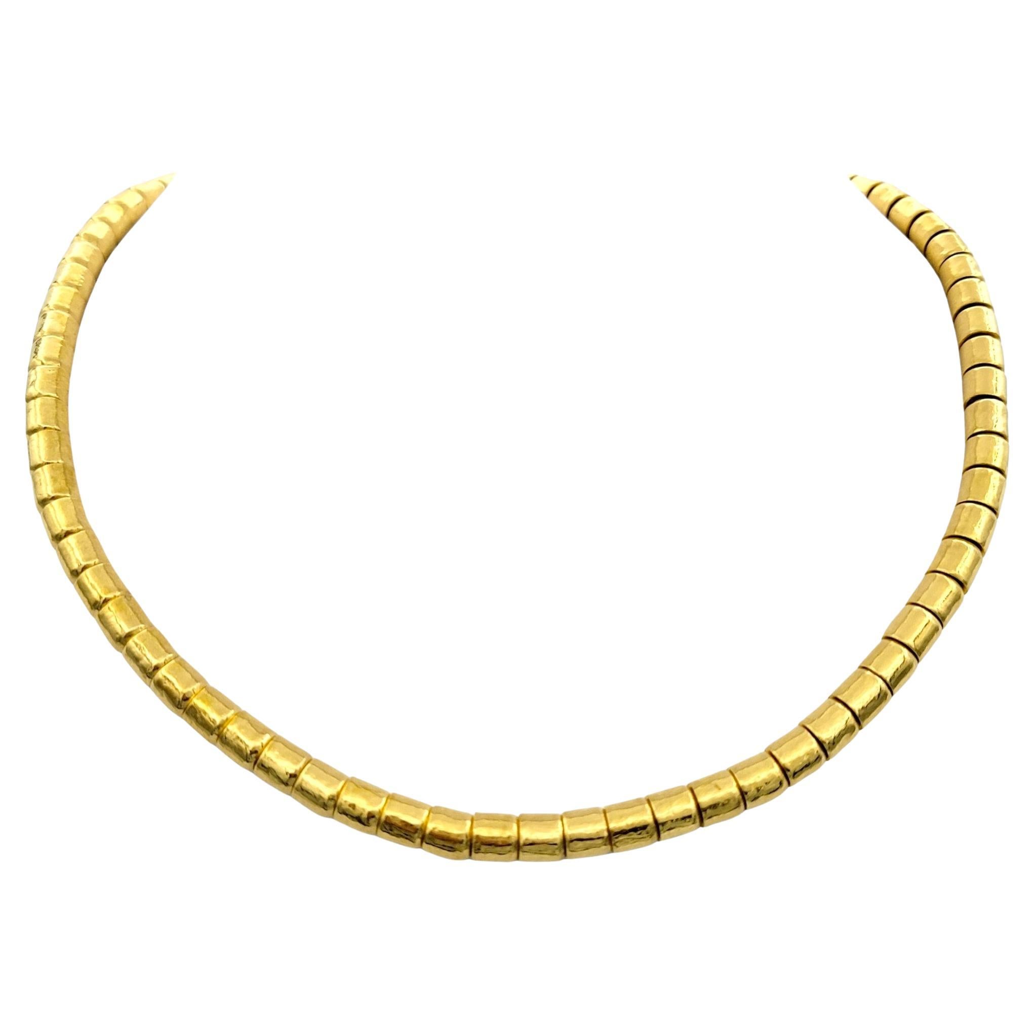 This gorgeous GURHAN Vertigo single strand necklace is a masterpiece set in 24 karat yellow gold. This exquisite necklace features meticulously crafted 5.5 mm gold beads, showcasing GURHAN'S signature hammered finish that adds texture and