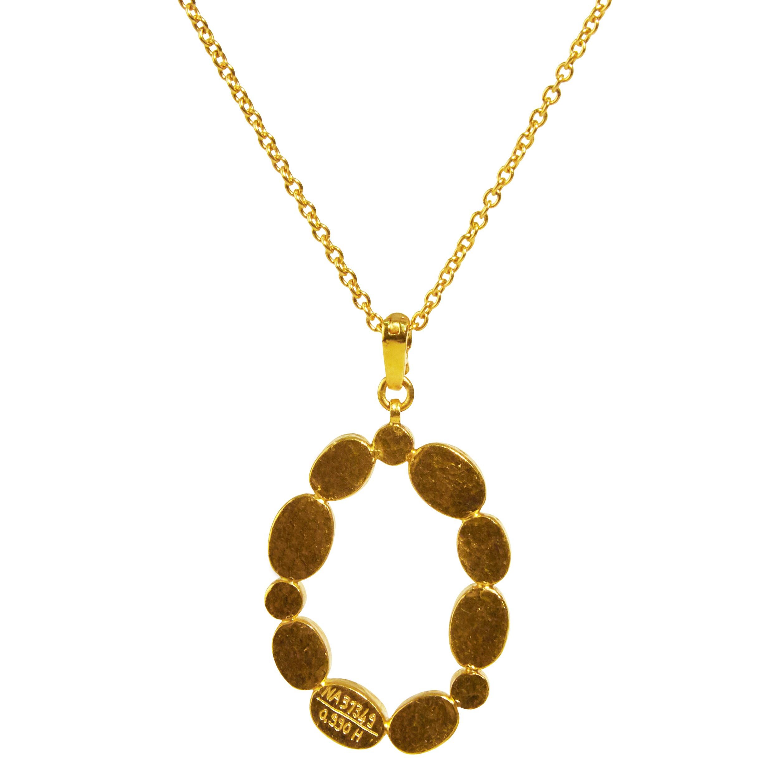 GURHAN open oval shaped Amulet Hue pendant necklace in 24 Karat hammered yellow gold featuring mixed sized oval and round faceted and cabochon Emeralds, 2.85cts. 16-18